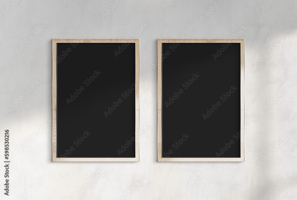 Two wooden billboards hanging on a sunlit wall mockup. Template of frames bathed in sunlight 3D rend