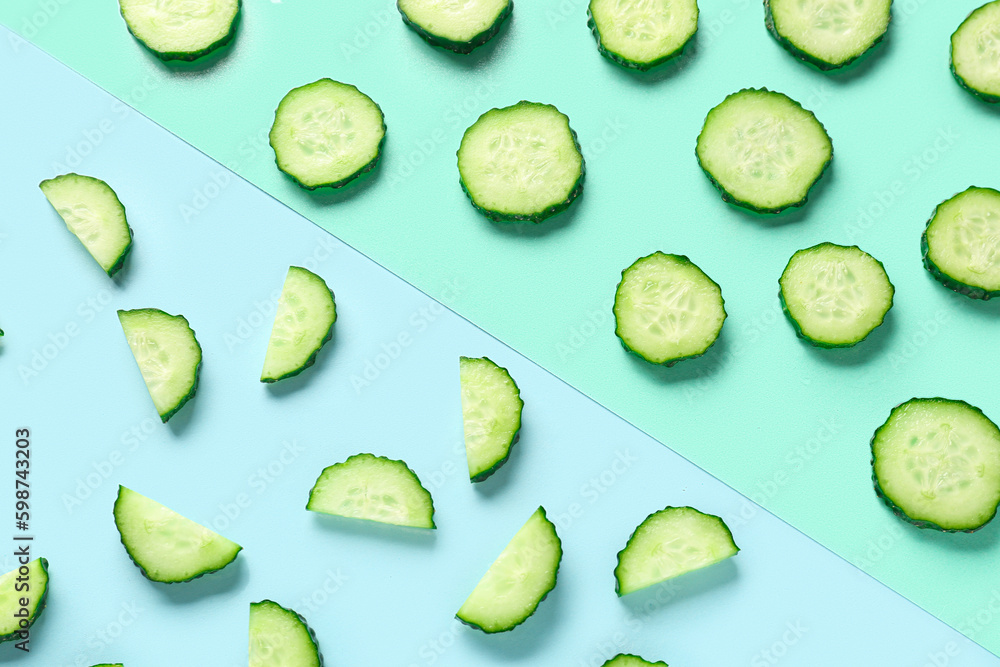 Slices of cucumber on colorful background