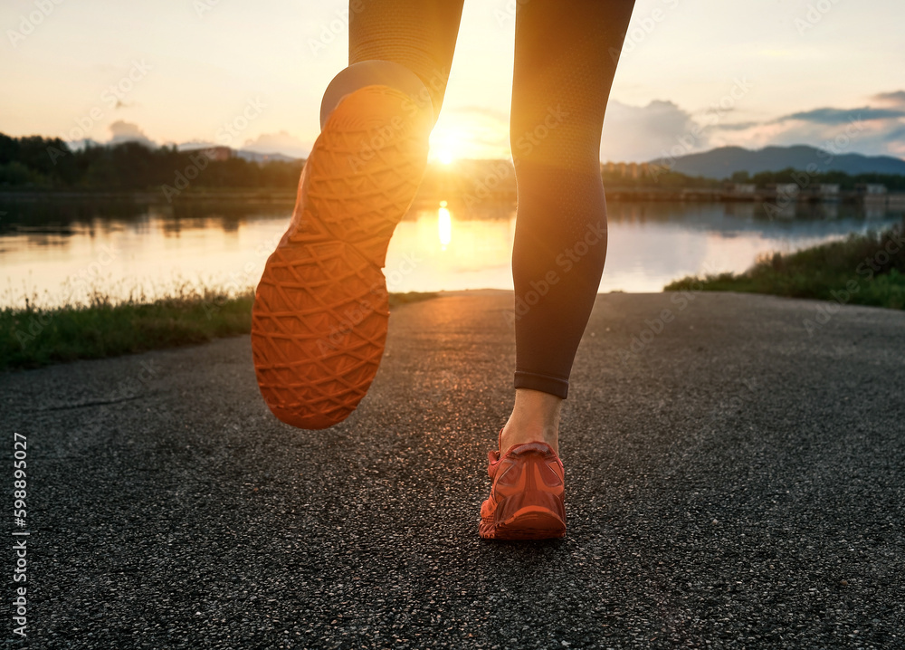 Woman running outdoors. Healthy lifestyle concept, people go in sports. Silhouette family at sunset.