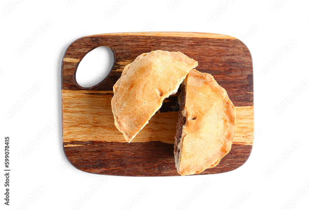 Wooden board with cut meat pot pie on white background