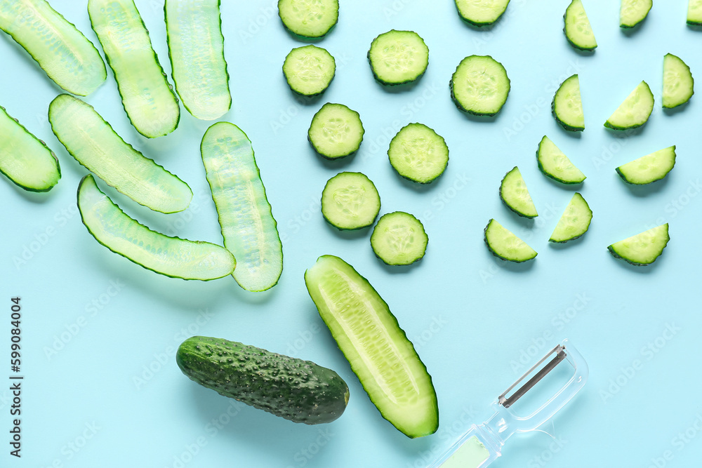 Slices of cucumber on turquoise background