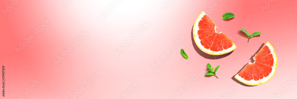 Fresh grapefruits and mints overhead view