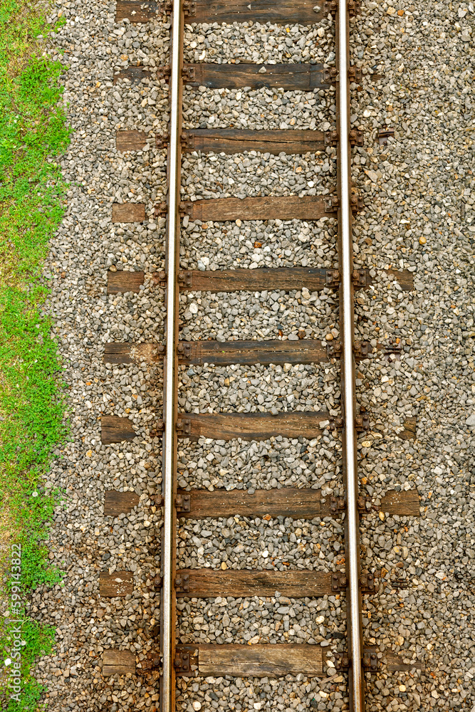 Top view of the old train tracks. Vertical shot.