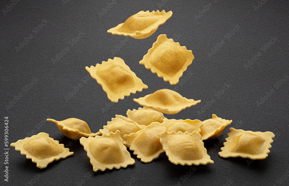 Ravioli pasta on black background