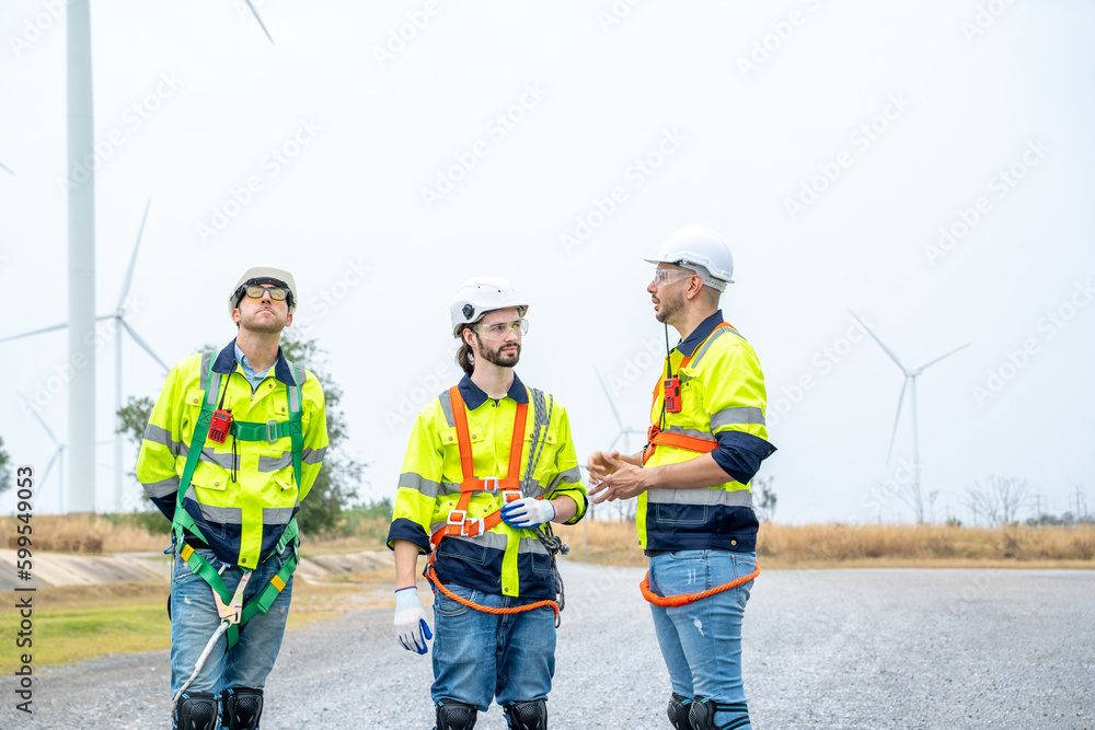 Engineers checking wind turbines,Renewable energy technology and sustainability,Alternative energy f