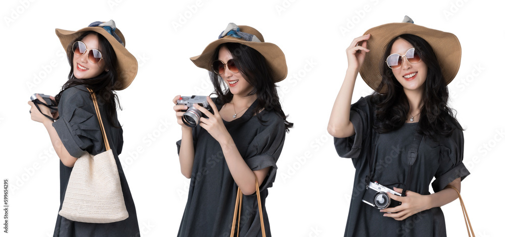 Young Asian woman Wearing a dress with a sun hat and sunglasses holding a camera travel concept Isol