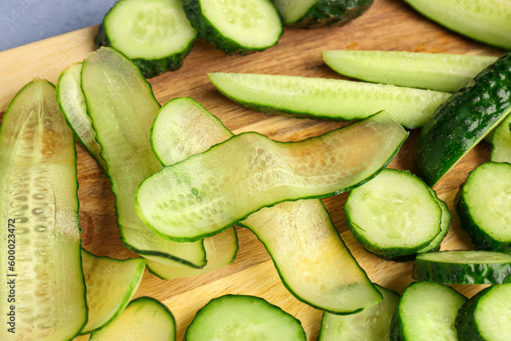 Slices of fresh cucumber on table, closeup