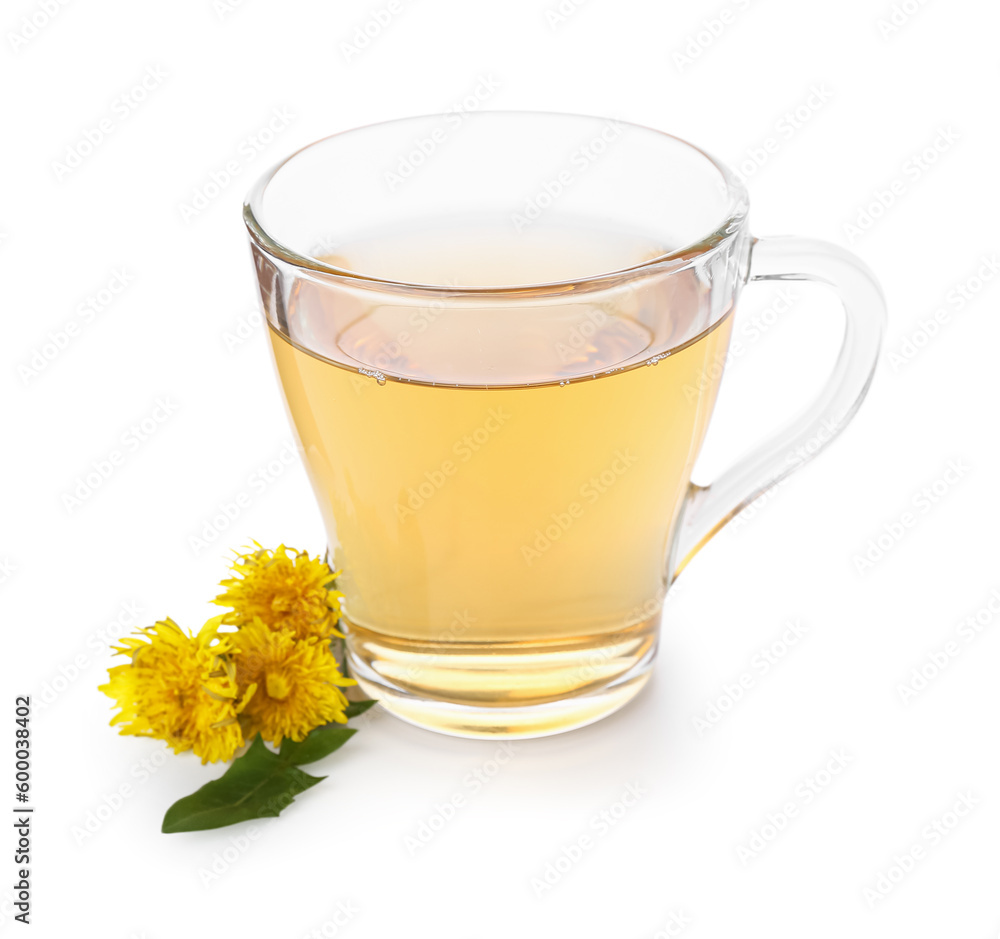 Glass cup of healthy dandelion tea on white background