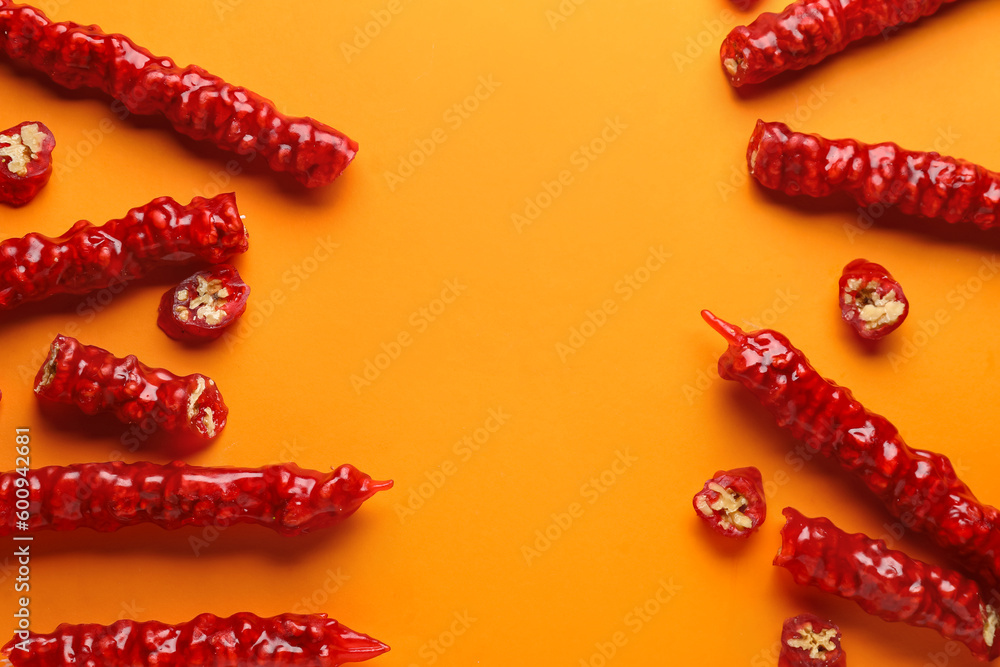 Frame made of tasty churchkhela on orange background