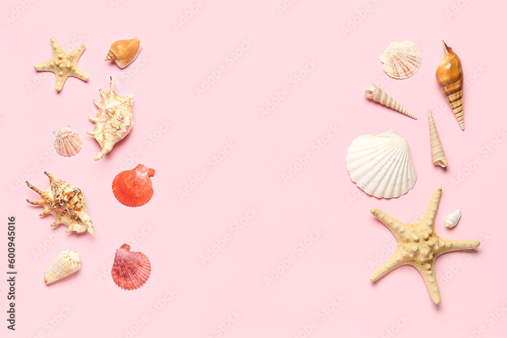 Frame made of seashells and starfishes on pink background