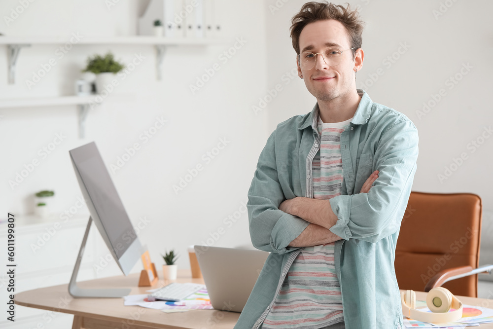 Portrait of male graphic designer in office