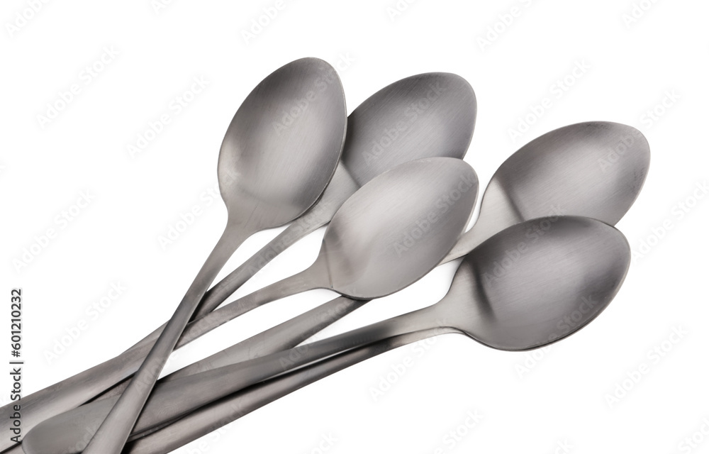 Stainless steel spoons on white background