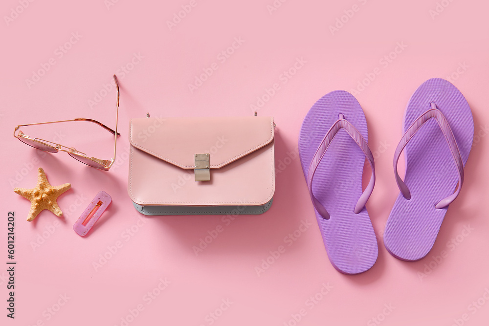 Stylish bag and different accessories on pink background