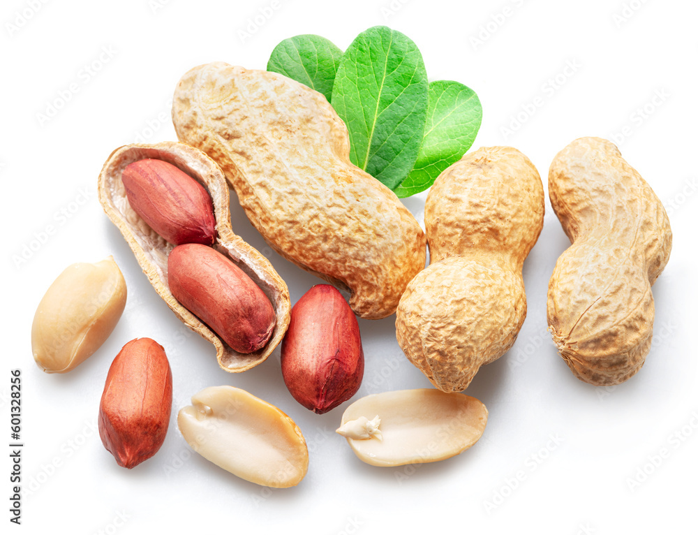 Peanuts whole and cracked isolated on white background.