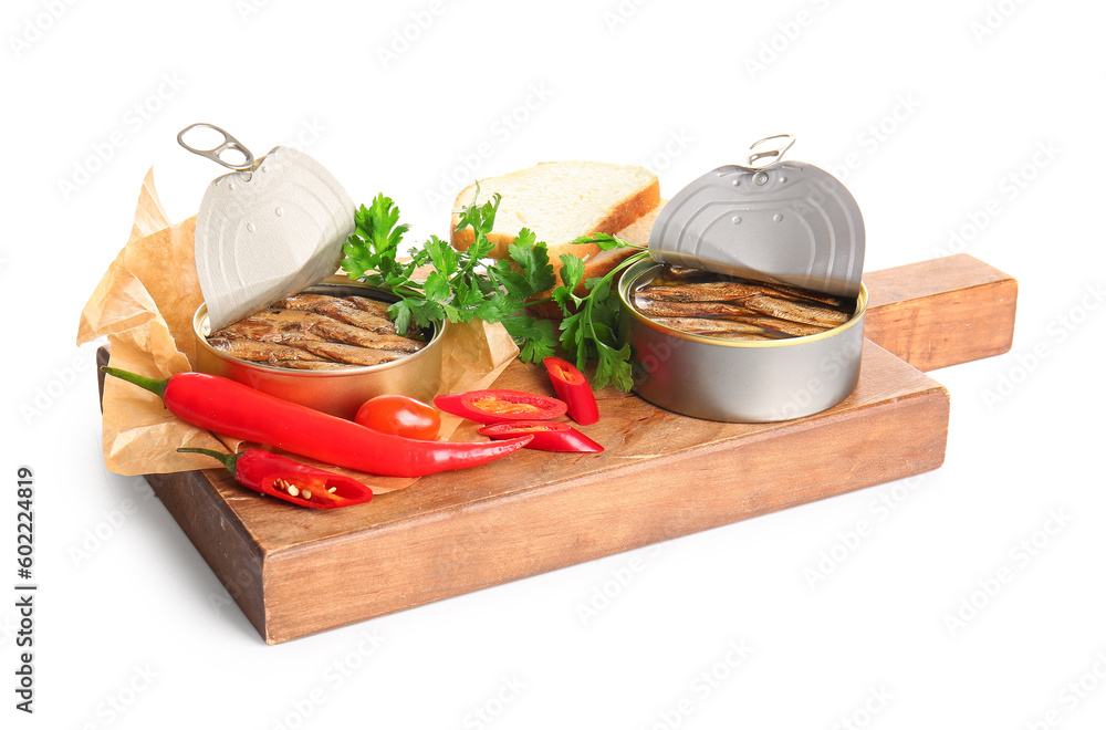 Board of canned smoked sprats with parsley and chilli on white background