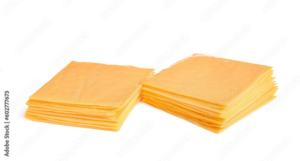 Stacks of tasty processed cheese on white background