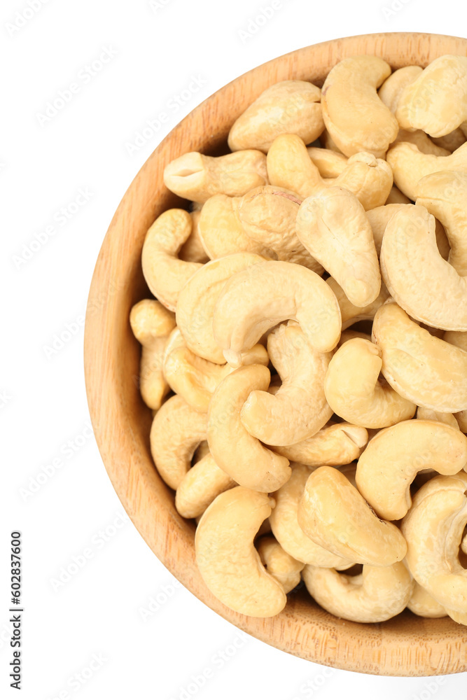 Bowl with tasty cashew nuts isolated on white background, closeup