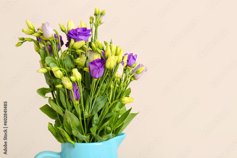 Jug with eustoma flowers on white background