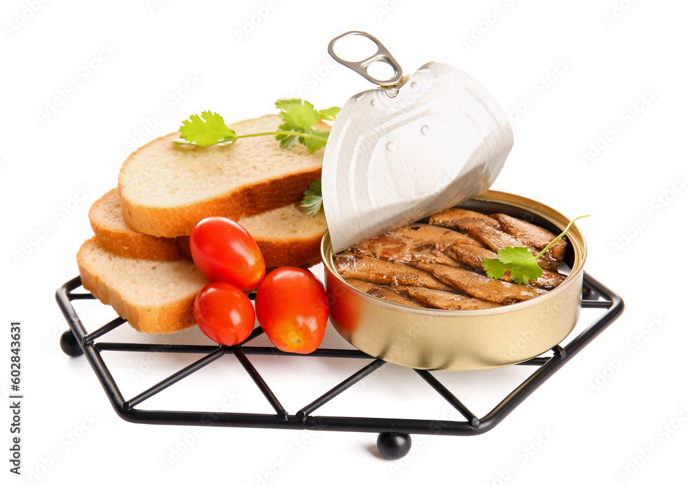 Canned smoked sprats with parsley and tomatoes on white background