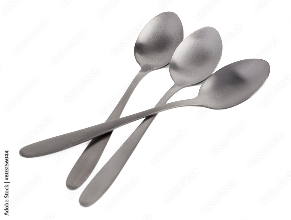 Stainless steel spoons on white background