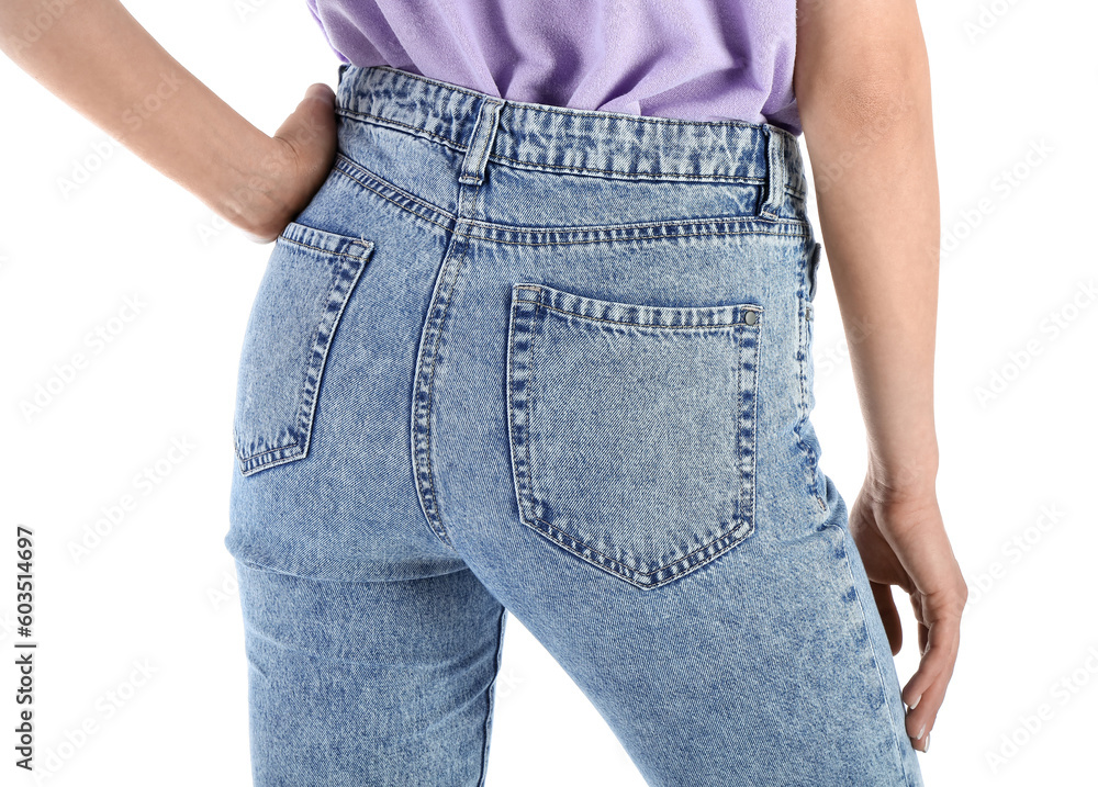 Young woman in stylish jeans on white background, back view