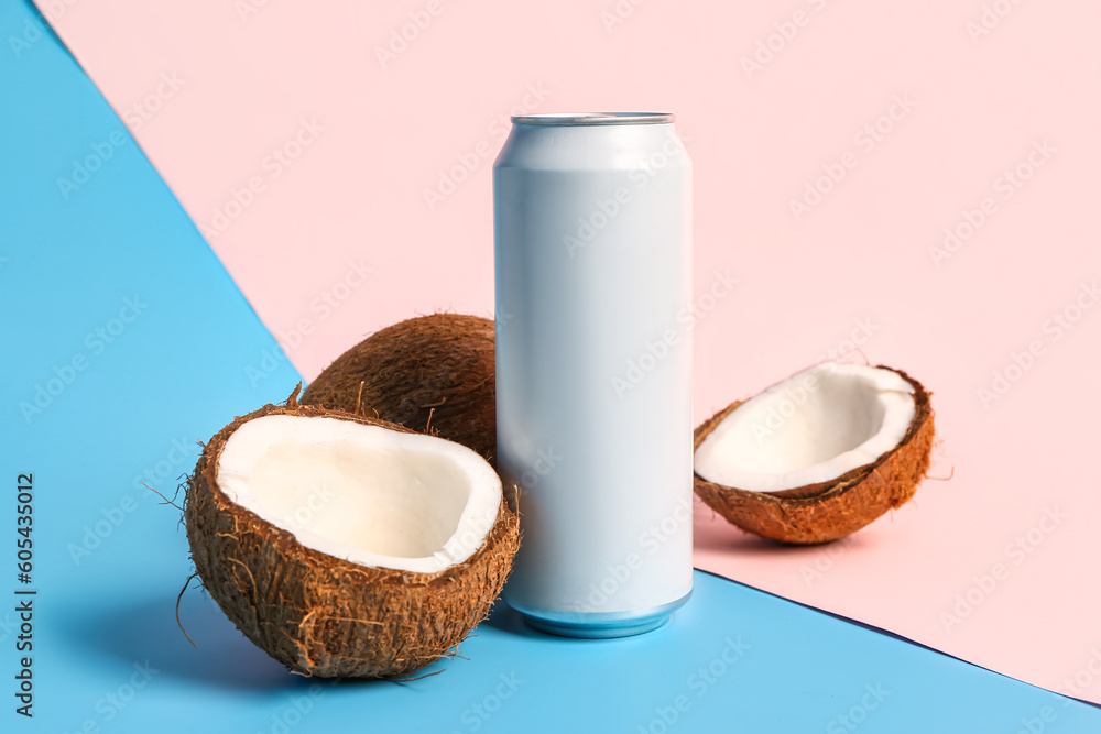 Composition with can of fresh soda and coconut on color background