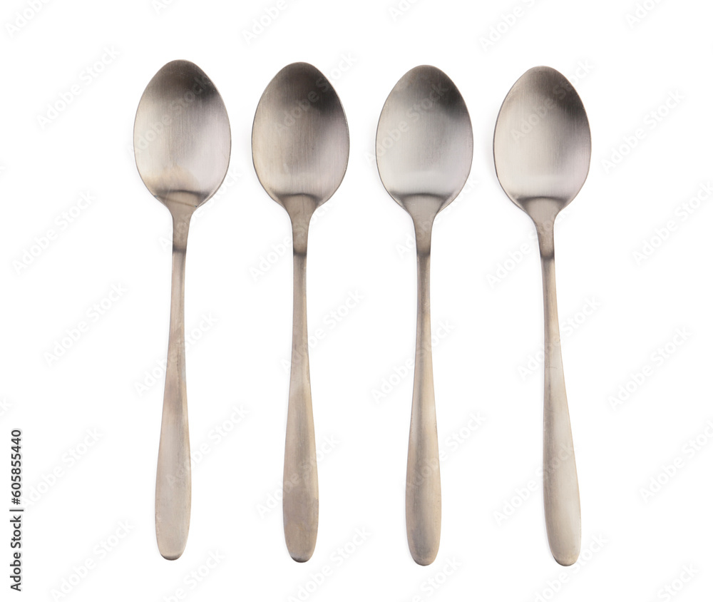 Stainless steel spoons on white background