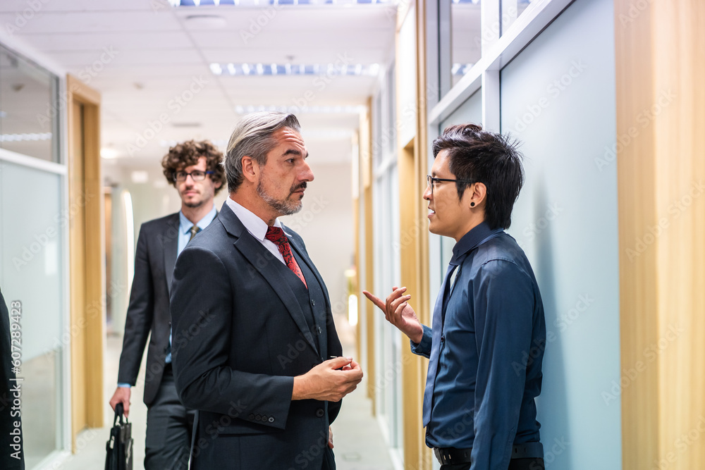 Caucasian businessman making a handshake together while stand in office. 