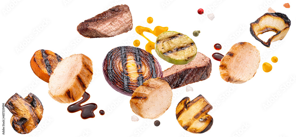 Grilled beef slices and vegetables isolated on white background