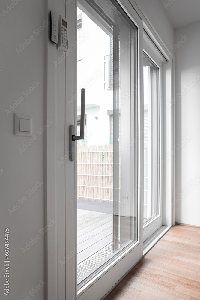 Big glass door in light room