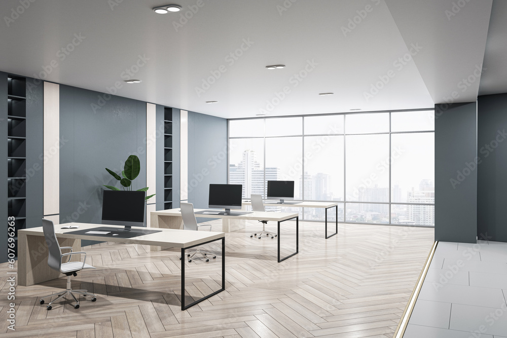 Perspective view of modern empty office interior with concrete and wooden floor, dark walls and desk