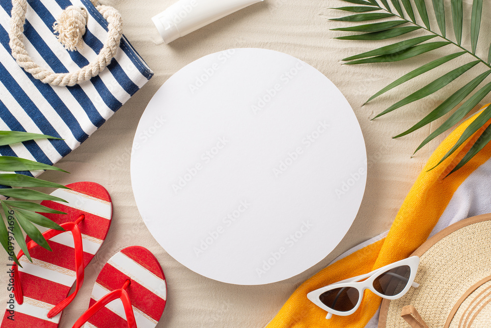 Summer bliss. Top view of stylish sunglasses, sunhat, beach bag, flip-flops, sunscreen, towel, and p