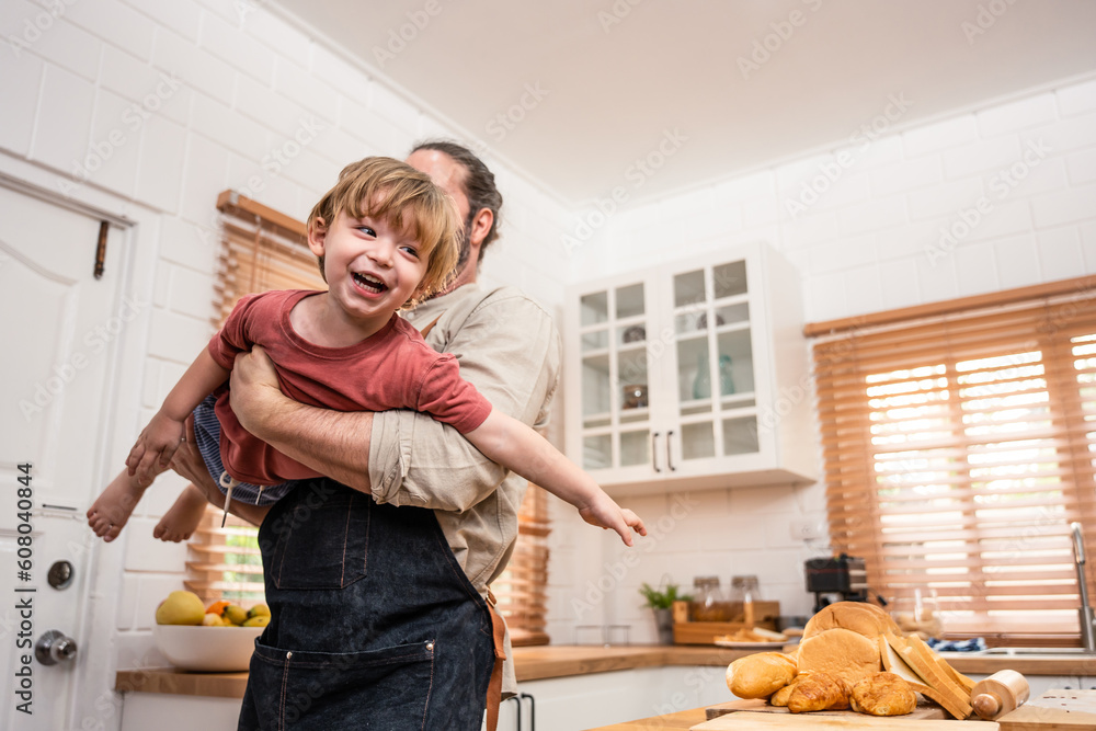 Caucasian family spending leisure free time together indoors in house. 