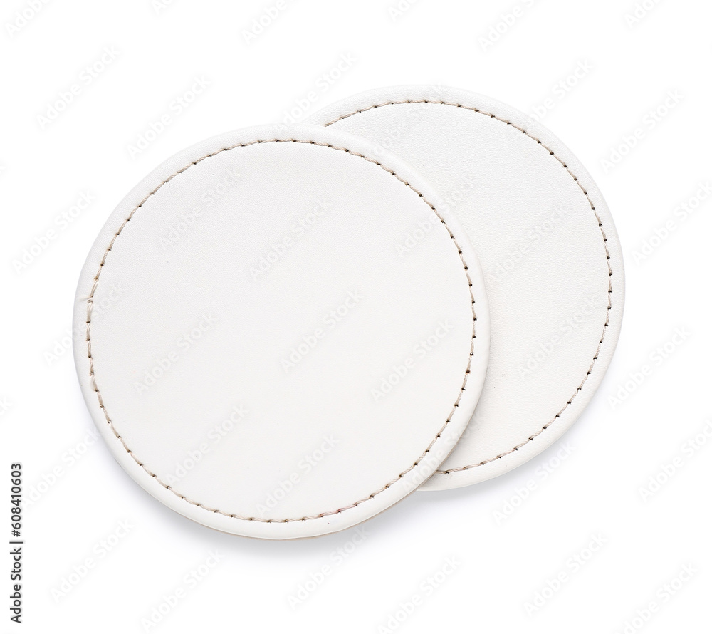 Leather drink coasters isolated on white background