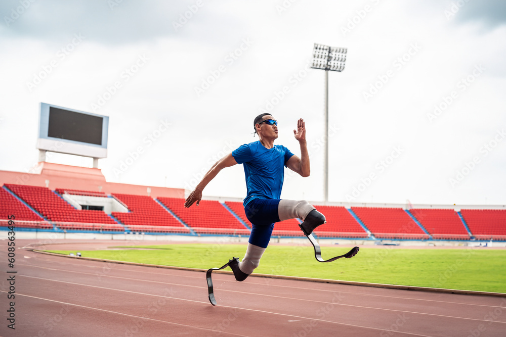 Asian para-athletes disabled with prosthetic blades running at stadium