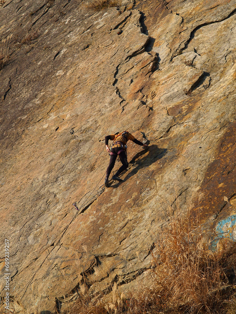 climber on the orange rock