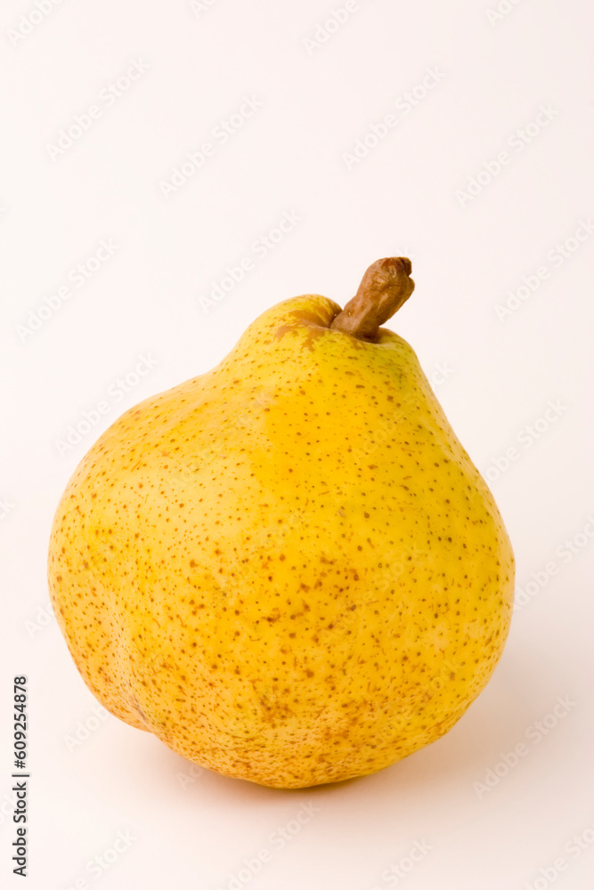 A single pear set against a plain background