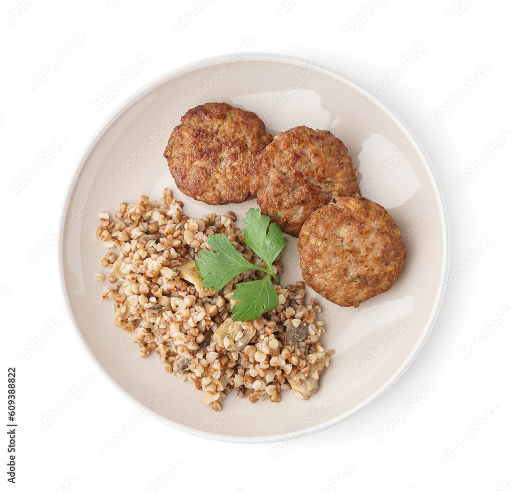 Cutlets with buckwheat, mushrooms and parsley on white background