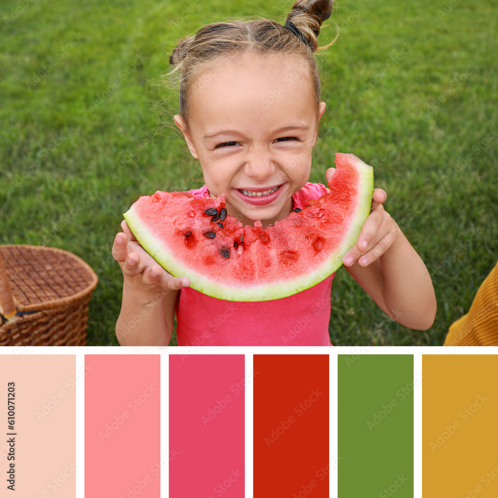 Cute little girl eating sweet watermelon in green park. Different color patterns