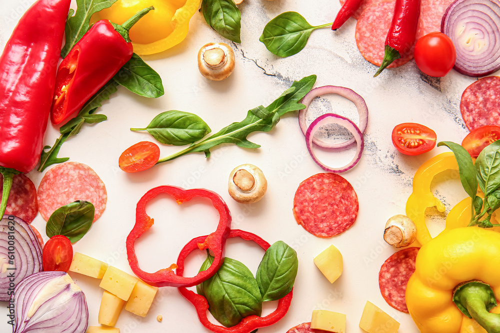 Ingredients for preparing pizza on white background