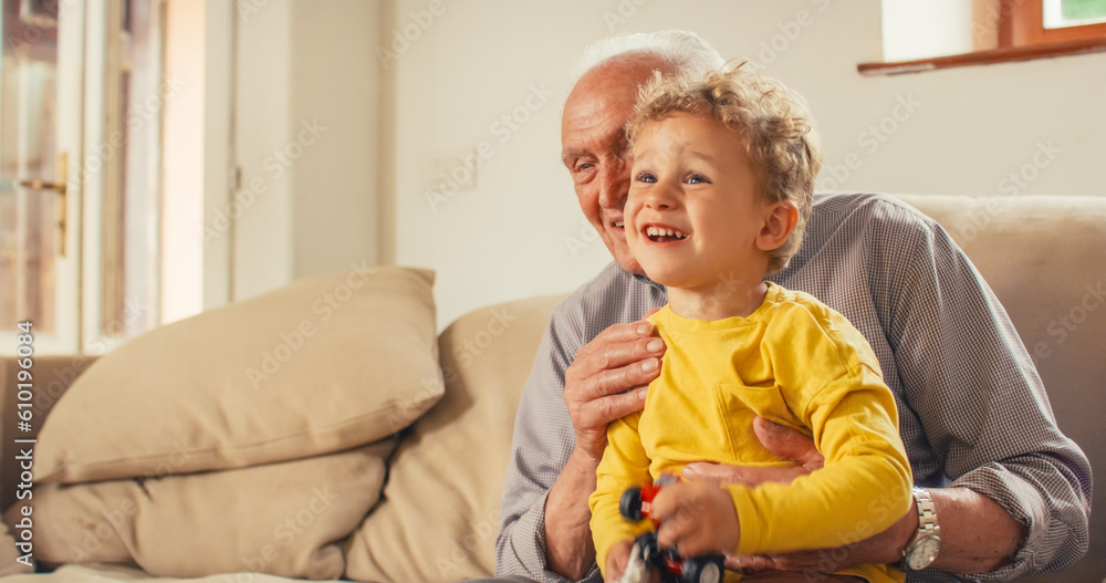 An Authentic Heartening Moment between Kid and his Grandfather: a Senior Man Talking to his Grandson