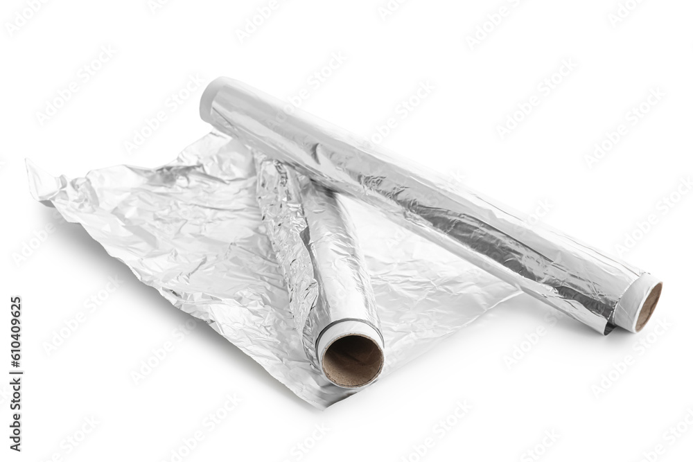 Rolls of aluminium foil on white background