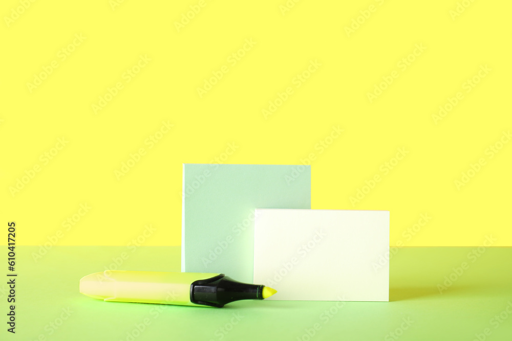 Sticky notes with marker on color background