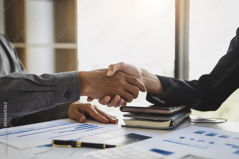 Handshake, Businessman shaking hands in a meeting and teamwork concept in business cooperation.