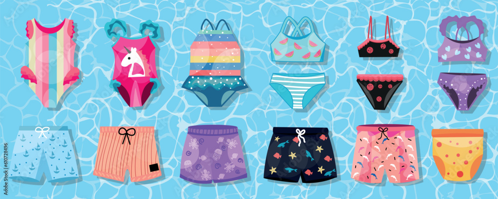 Collection of childrens swimming suits on blue background