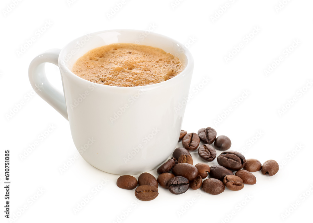 Cup of delicious espresso and coffee beans on white background