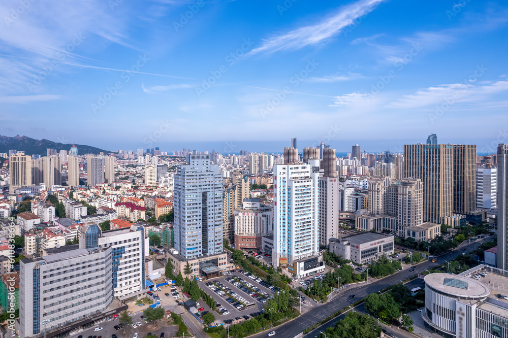 Aerial photo of urban landscape in Qingdao coastal bay area