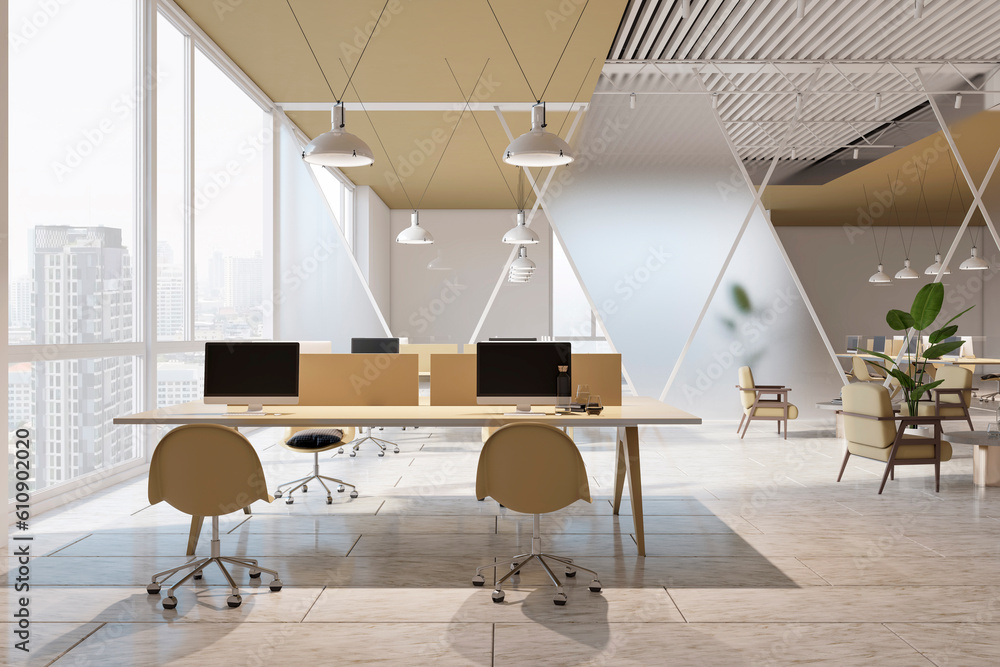 Front view on light workspace tables with modern computers in open space office with concrete tiles 