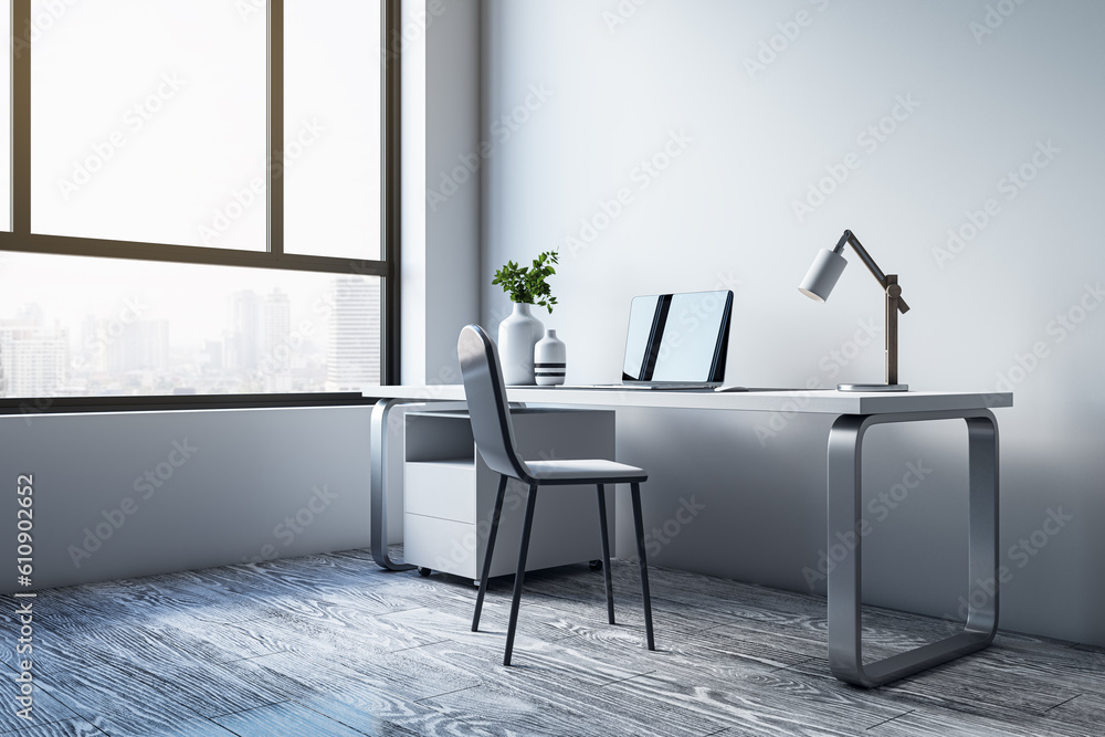 Contemporary simple office interior with furniture, equipment, decorative items and window with city