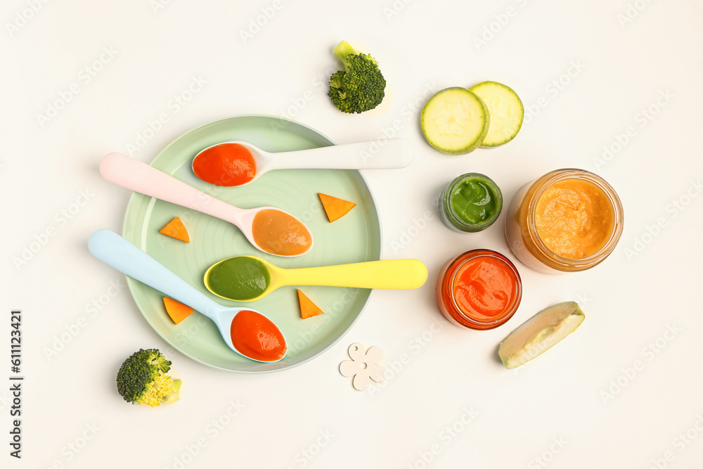 Composition with healthy baby food and vegetables on white background